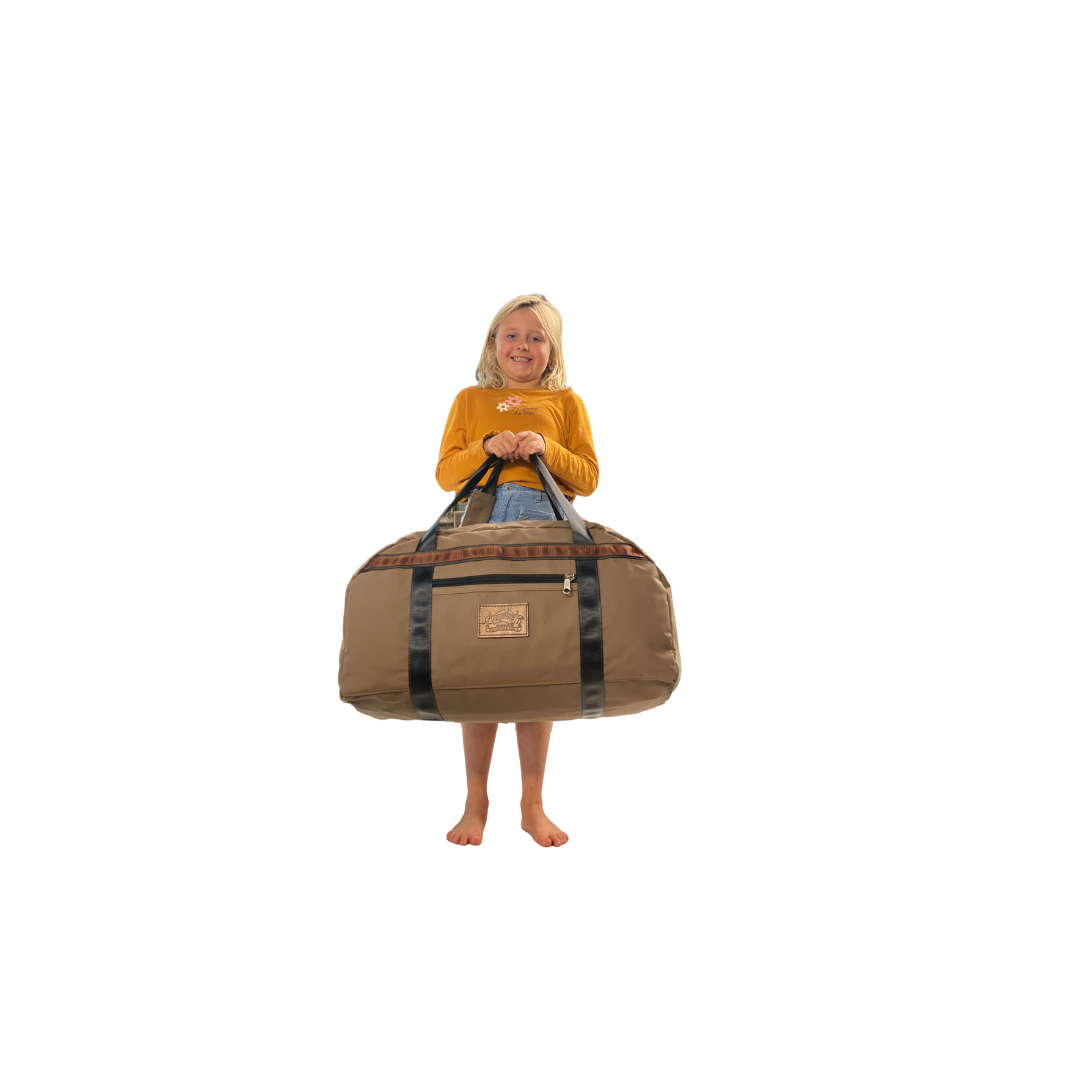 Girl Holding Antelope Brown Canvas Travel Bag. 