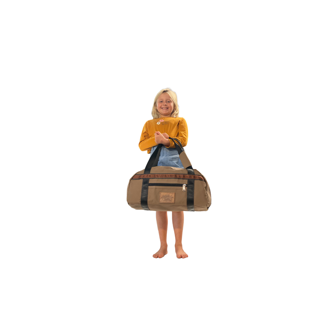 Girl Holding Antelope Brown Overnight Canvas Bag.